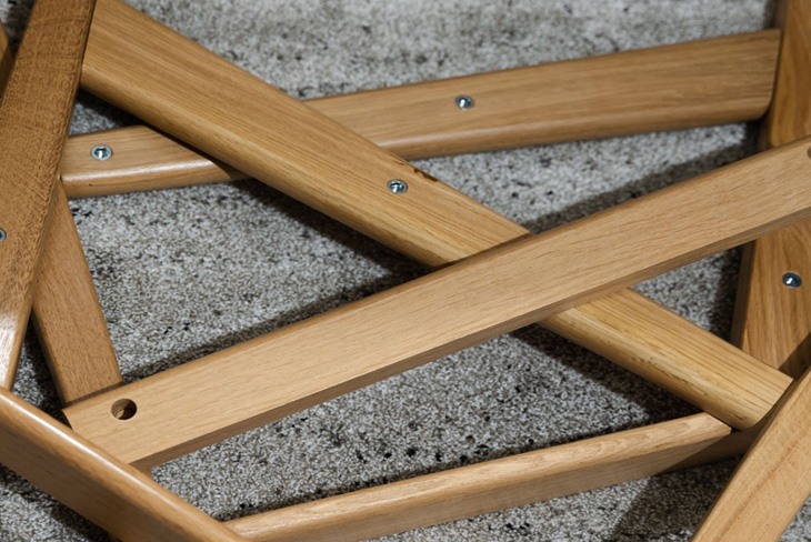 Reused wood components arranged for repurposing.